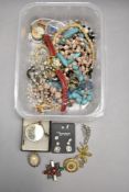 A tray of costume jewellery earrings, bead necklaces, etc