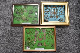 Three framed display of Detector Finds, frame 1 is glazed includes various Buckles 15th to 19th