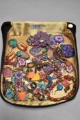 A soft case of costume jewellery earrings, bracelet etc