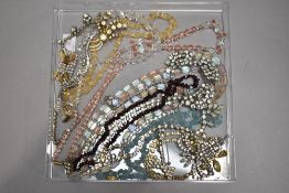 A selection of mainly vintage costume jewellery including strings of crystal beads, diamante