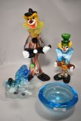A selection of 20th century glass wares including two Murano style clown figures along with aqua
