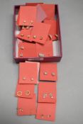 A box of costume earrings on cards, 20 plus pairs
