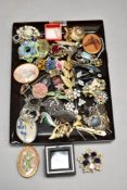 A tray of costume broaches, earrings etc