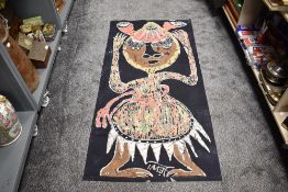 A 20th century African batik print on fabric of a tribal dancer