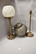 Two late Victorian desk top library lamps having heavy brass stem bases one with milk glass shade,