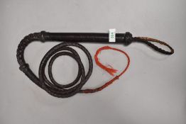 A vintage Horse Carriage Whip, leather grip handle, length 25cm, overall length 170cm