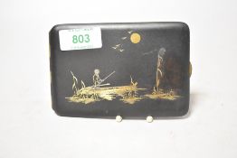 An early 20th century Japanese Komai cigarette case dated 1933 decorated with fishing scene