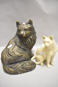 Two 20th century cat figures one stone cast and similar smaller resin example