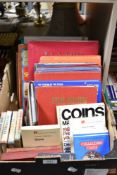 A box containing a mixture of books including observers books of flower, automobile, flags and
