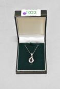 A cubic zirconia and blue paste teardrop cluster in white metal mount stamped 925 on a white metal