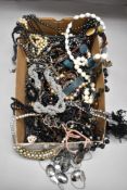 A large box of costume necklaces etc
