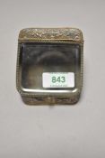 A 19th century pocket watch casket or container having embossed hunting scenes to case