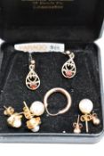 A selection of 9ct gold and yellow metal earrings including cultured and simulated pearl,hoop,