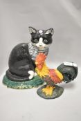 Two 20th century cast iron door stops including a cockerel and black tabby cat