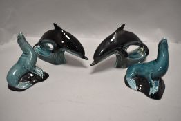 Four 20th century Poole figures of Dolphin and Seals