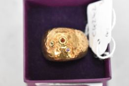 A gold plated silver domed ring by Etrusca Italy having three non precious stones in collared mounts