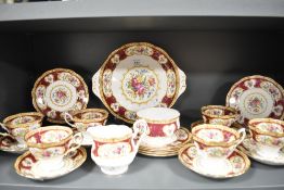 A 20th century Royal Albert part tea service in the Lady Hamilton pattern