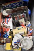 A box of Pepsi collectables, including ash tray, cars, mirror and more.