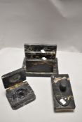 An Art Deco desk top stationary set in black marble including blotter inkwell and letter rack