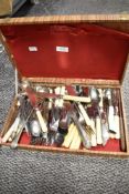 A mixed box of plated cutlery including bone and MOP handled items.