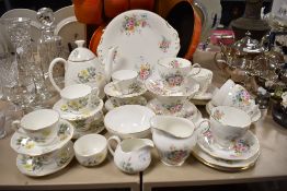 Two partial sets of tea service, including Adderley fine bone china cups, saucers,sugar basin and