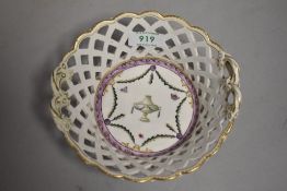 A Victorian fruit basket by Royal Crown Derby bearing blue crown mark, having pierced sides with