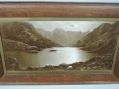 Keene, (19th/20th century), a pair of sepia prints, Scottish Lochs, 30 x 58cm, oak framed and