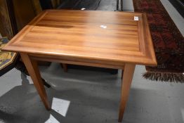 A mid century side table in Sapele