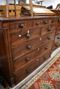 A Victorian chest of three over two over three drawers having cock beaded fronts with turned