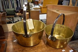 Two traditional brass jam pans