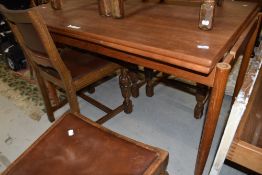 A vintage teak drawer leaf table, stamped Made in Denmark to underside