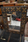 An Arts and Crafts style mirror