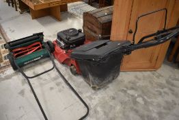 An MTP petrol mower and qualcast push mower