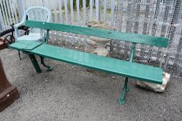 A traditional railway bench A/F painted green