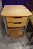 A modern office or similar occasional table with double drawer