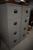Two modern four drawer filing cabinets