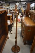 A standard lamp base having turned and fluted frame