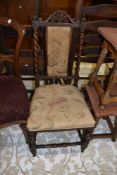 A Victorian mahogany salon chair having twist frame