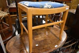 A vintage dressing table stool