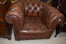 A Chesterfield style armchair