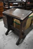 A traditional oak ecclesiastical low lecturn