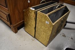 Two vintage brass magazine racks