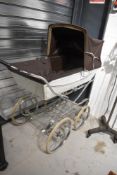 A vintage pram, Silver Cross baby carriage