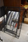 A modern wirework wall mirror