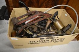 A selection of antique and later hardware tools including yard measure, pillar drill and burners
