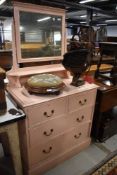 An early 20th century painted pine dressing table chest of two over two drawers