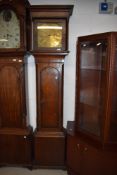 An early 19th century oak long case clock having brass dial with fretwork border marked E Tofter