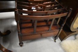 A reproduction mahogany canterbury magazine rack