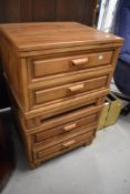 A pair of Oriental hardwood bedside drawer units