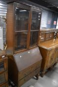 An early 20th Century oak bureau bookcase